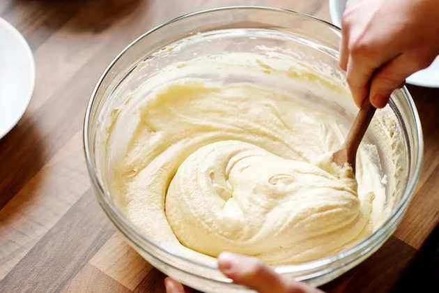 chef-making-muffins-batter-picture-id175240339 (1)