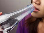 ​Drinking water from a bottle