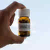 Unlike the COVID vaccines, how will the COVID pill be administered?