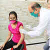What parents can do if their children experience fever or heachache post-vaccination?