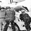 tourist vehicles stuck on a snow-bound road