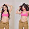 Back to unbuttoning her pants