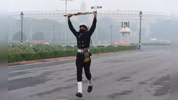 A Navy person runs