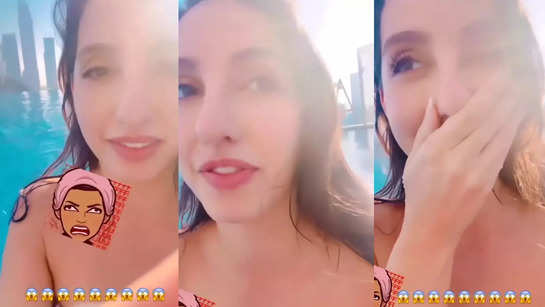 Nora Fatehi enjoys pool time in Dubai wearing a classy bikini but drops her friend's phone in water while recording herself. Check out what happens next