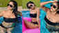 Rubina Dilaik oozes oomph in a black strapless bikini as she dips into the pool