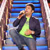 Singing a song in English paying a tribute to his father