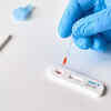 When should someone without any symptoms take a test?