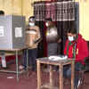 Election officials conduct mock poll at polling booth number 374 in Daniyapur of Rampur Assembly constituency