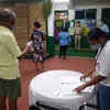 People queue outside a polling booth