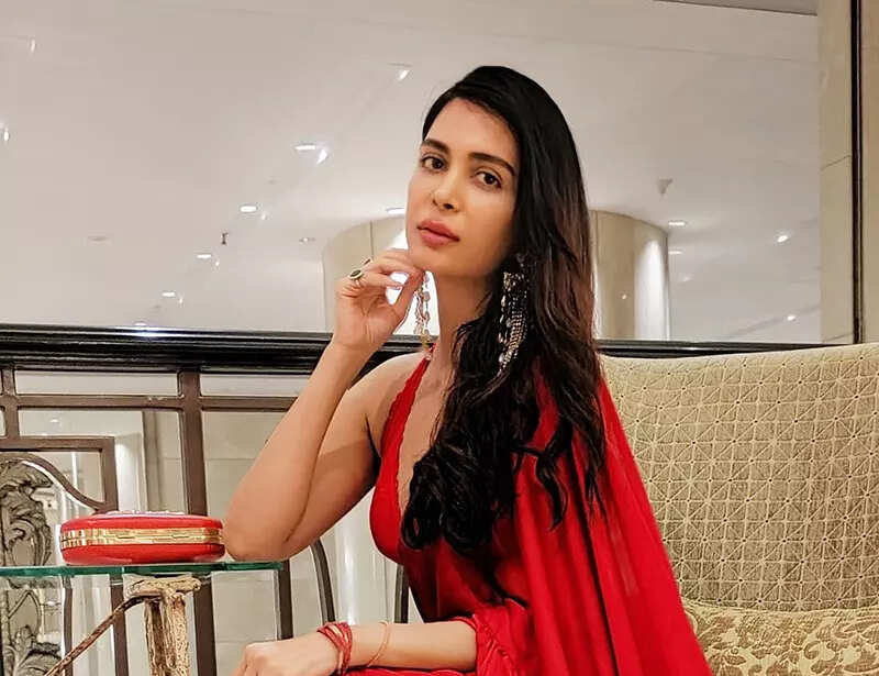 Former Miss India Ankita Shorey looks radiant in a red ruffled saree in these dreamy pictures