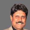 <i class="tbold">Kapil Dev</i>