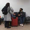 Indian nationals at Bucharest airport, waiting to board evacuation flight