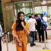 Article image for: Rashmika Mandanna sports orange athleisure as she arrives at airport