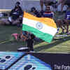 An Indian fan with the national flag runs around the boundary line during the match between India and Pakistan at Bay Oval in Tauranga. (AFP Photo)