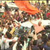 Uttar Pradesh CM Yogi Adityanath arrives at the BJP office in Lucknow; received by a huge crowd of party workers.