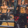 Flaunting his sculpted abs