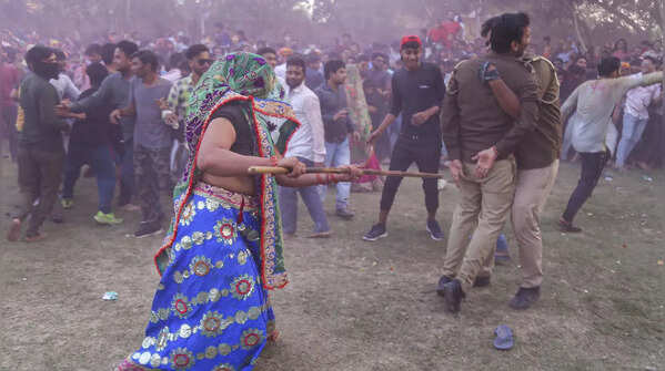 Photos of Mathura's famous 'Lathmar Holi'