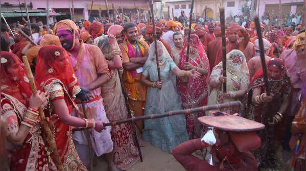 Photos of Mathura's famous 'Lathmar Holi'