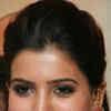 <i class="tbold">jhumkas</i>