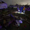 Debris of damaged homes after a tornado struck Arabi, Tuesday.
