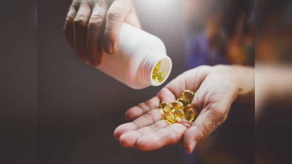 What are the symptoms of excess vitamin D?