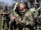 Ukrainian reservists marry amid war; see pics