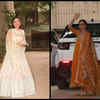 Kareena Kapoor Khan and Karisma Kapoor pose for the paparazzi as they reach home post Ranbir Kapoor-Alia Bhatt's mehendi ceremony