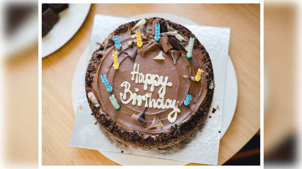 Step-by-step birthday cake with leftover biscuit