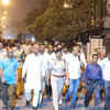 Peace March organised by Delhi Police alongwith members of Aman committee in area of Jahangirpuri. People were appealed by Aman Committee to maintain peace & harmony, not to spread & trust rumours/misinformation & to report mischievous activities, police said. (ANI)