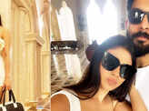 Mouni Roy turns heads in a mini dress, twins in white with hubby in these happy pictures from Doha