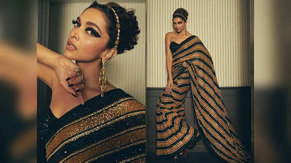 Deepika Padukone sets the red carpet on fire in a tiger-inspired sari