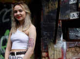Ukrainians get tattoos to raise funds for military