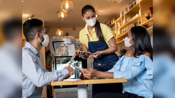 What's the difference between service tax and service charge?