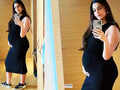 Sonam Kapoor flaunts her baby bump in a black bodycon dress in this new mirror selfie