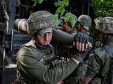 Ukrainian troops battle Russians street-to-street in eastern region; see pics