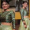 Pretty in a green top and skirt