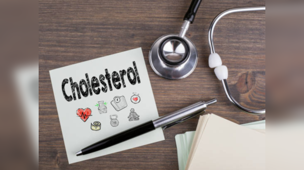 Without a test it is difficult to check cholesterol level, however few symptoms can guide you