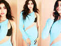 Janhvi Kapoor flaunts her toned midriff in a blue slit dress in these captivating pictures