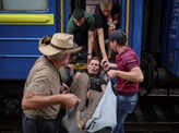More Ukrainians flee besieged areas; see pics
