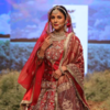Shehnaaz Gill turns bride in a stunning red lehenga for her debut walk at Times Fashion Week