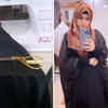 Stitching her own abaya