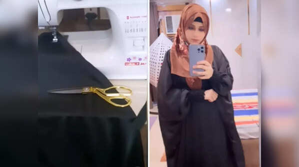 Stitching her own abaya