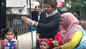 Kartik Aaryan looks dapper in casual avatar; poses with school kids