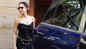 Malaika Arora snapped in black satin slip dress, black shades compliment her casual look