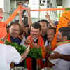 Party workers receiving Fadnavis with a garland upon the BJP leader & Maharashtra deputy CM's arrival at the Nagpur airport