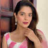 <i class="tbold">pooja gor</i>