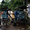 BMC workers pumps out water by using pumping machines at Shell colony during heavy rains in Mumbai