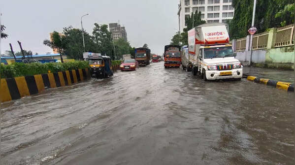 Rain menace in Mumbai: Pics of waterlogged roads, flooded colonies