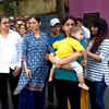 Deepesh's wife with their son