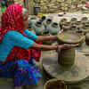 Kumhar making earthen pot